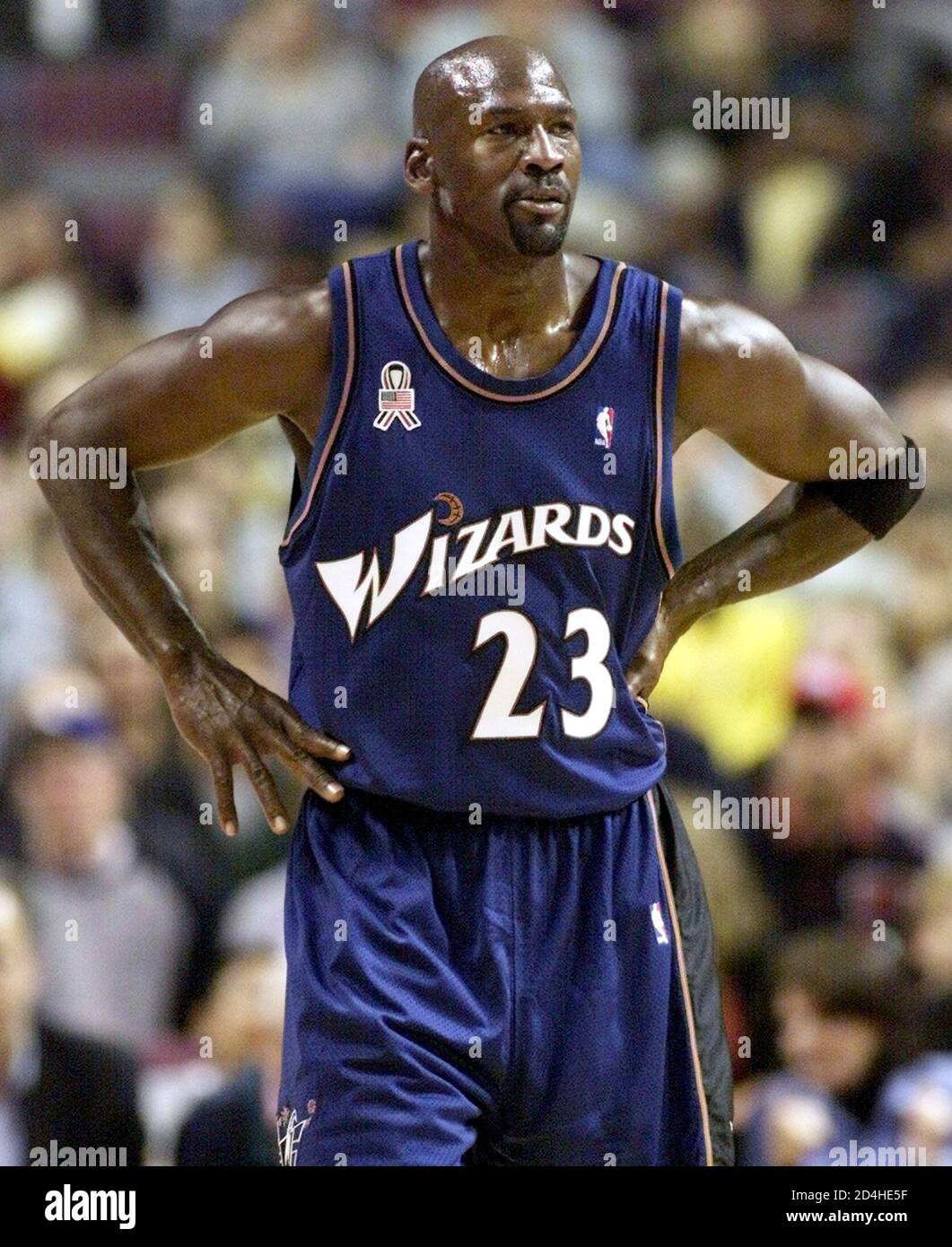 Washington Wizards guard Michael Jordan reacts after a foul call against  the Wizards during pre-season NBA action against the [Detroit Pistons in  Auburn Hills] October 11, 2001. This is Jordan's first game