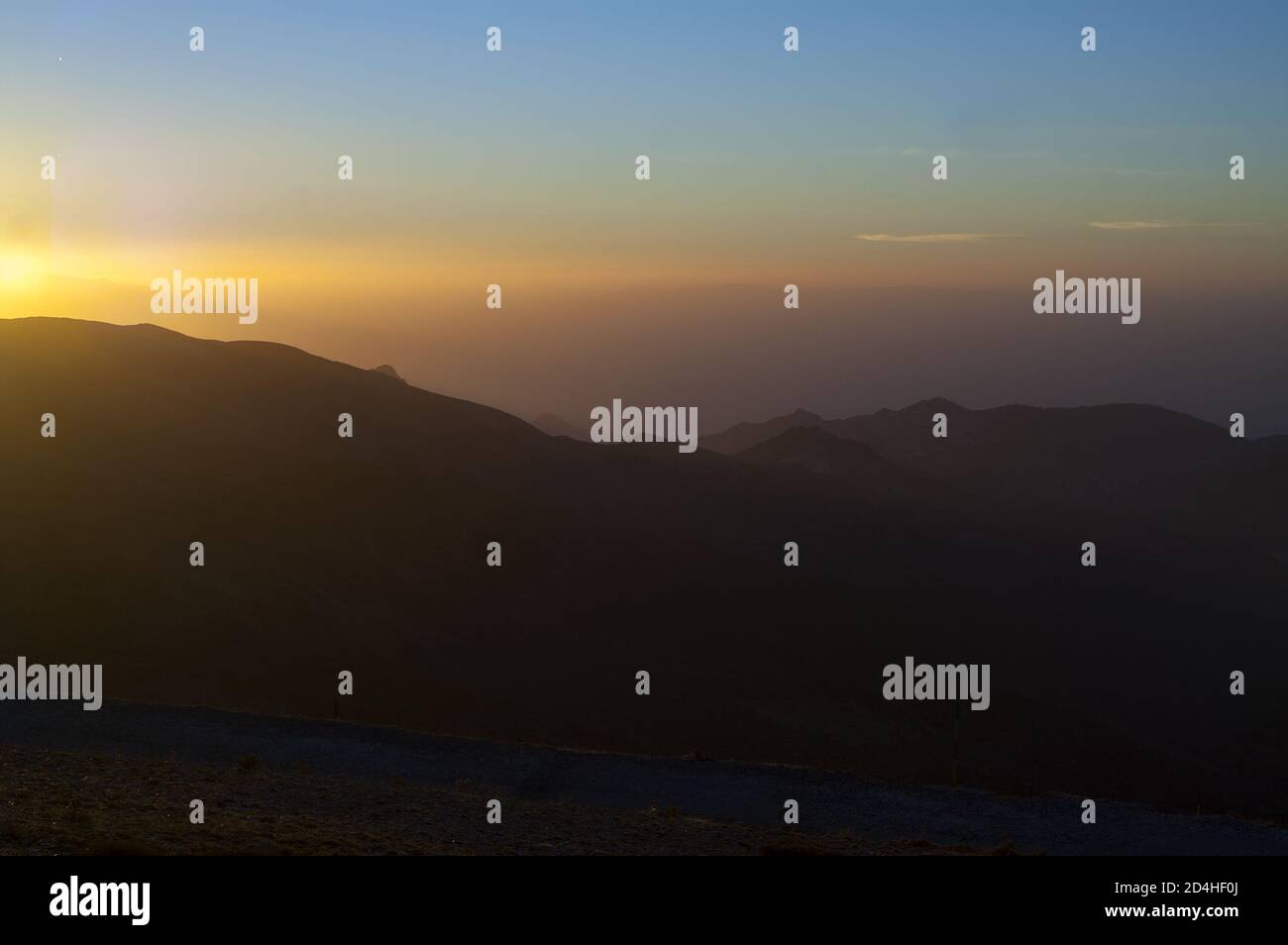 Sierra Nevada, España, Hiszpania, Spain, Spanien; Colorful sunset over the mountain tops. Bunter Sonnenuntergang über den Berggipfeln. 在山頂上的日落。 Stock Photo