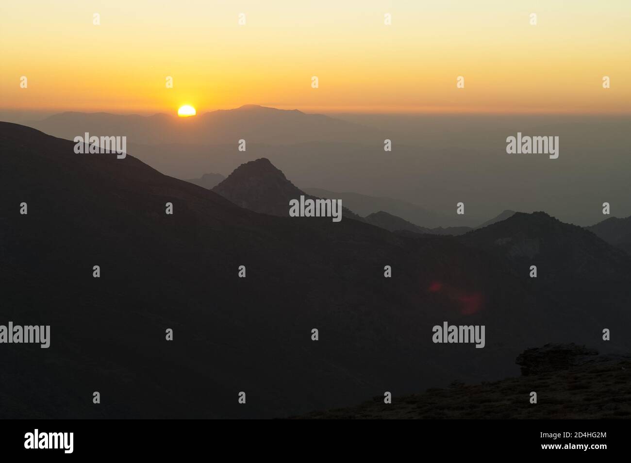 Sierra Nevada, España, Hiszpania, Spain, Spanien; Colorful sunset over the mountain tops. Bunter Sonnenuntergang über den Berggipfeln. 在山頂上的日落。 Stock Photo