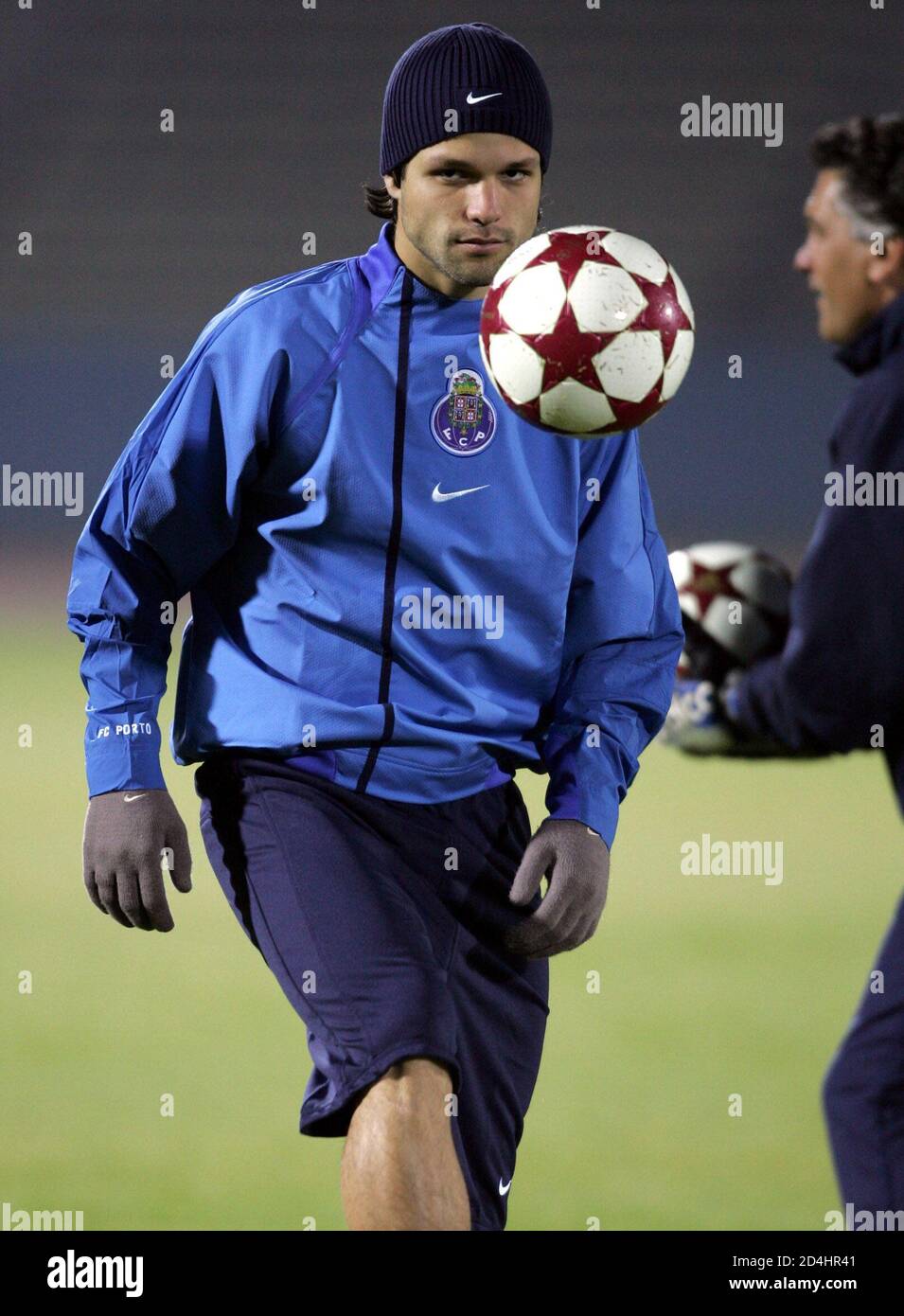 Portuguese FC Porto's midfielder Diego Ribas da Cunha of Brazil controls the ball during a practice session in Kawasaki, south of Tokyo, December 10, 2004. FC Porto is in Japan for the European-South American Cup club soccer championship against South-American club champion Once Caldas of Colombia on December 12. REUTERS/Issei Kato  IK/fa Stock Photo