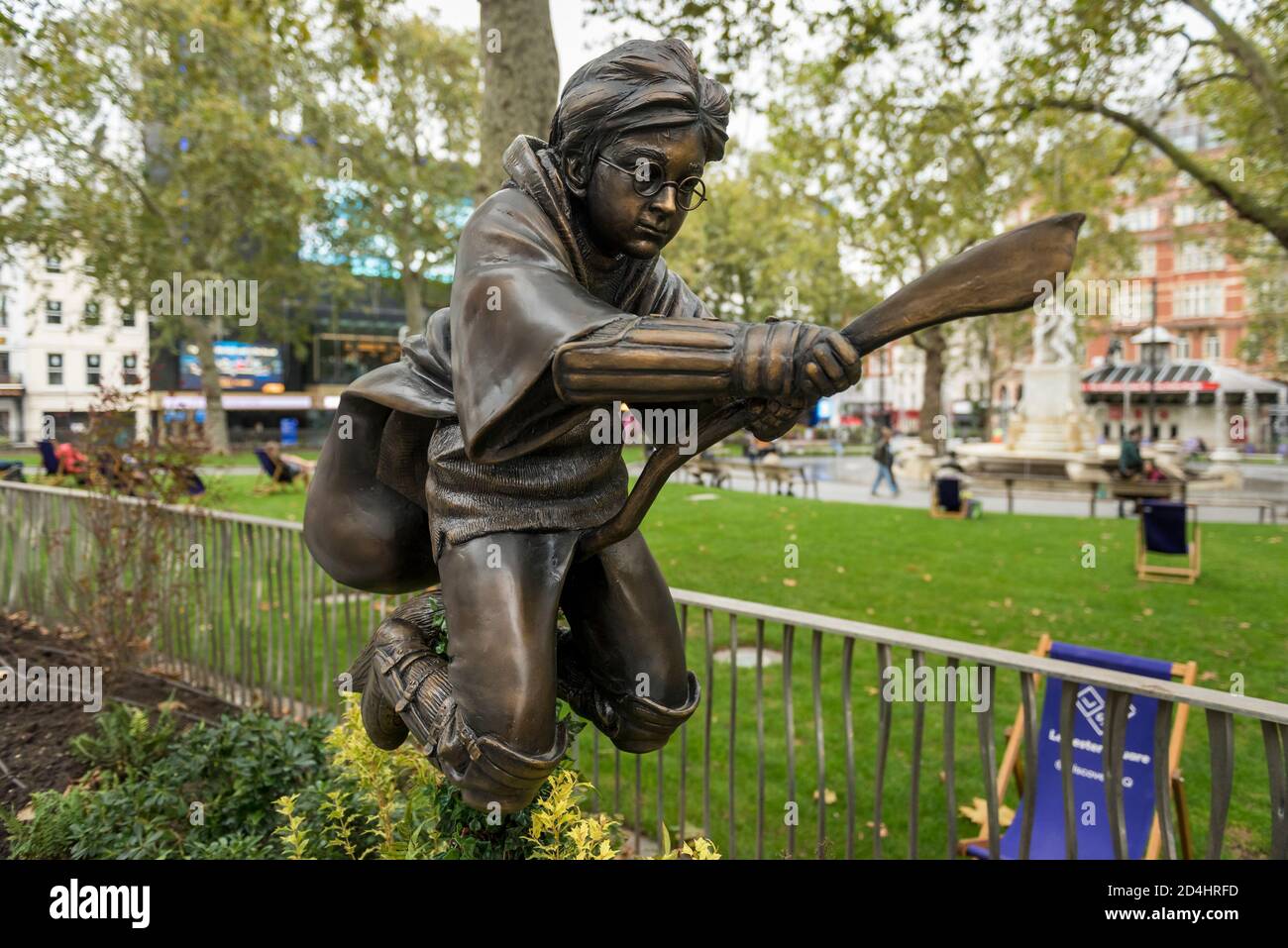 London, UK,  9 October 2020.  A statue depicting Daniel Radcliffe as the character Harry Potter riding his Nimbus 2000 during his debut Quidditch match in the film Harry Potter and the Philosopher’s Stone has been unveiled in Leicester Square.  It joins statues of several other movie characters in a series known as Scenes in the Square.  As a treat for movie fans, the nearby Odeon Luxe cinema is screening all of the Harry Potter movies back catalogue 9 to 14 October.   Credit: Stephen Chung / Alamy Live News Stock Photo