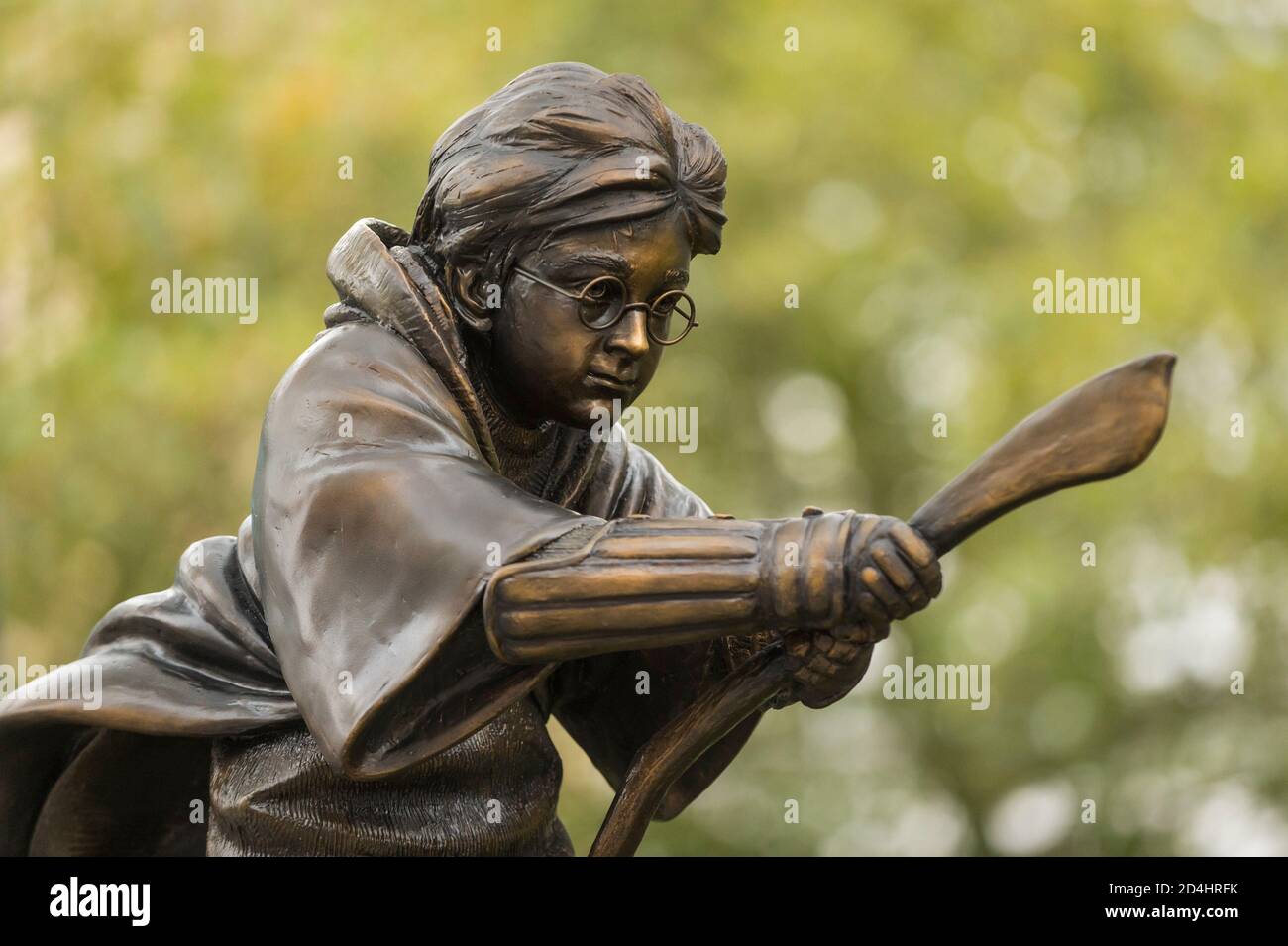 London, UK,  9 October 2020.  A statue depicting Daniel Radcliffe as the character Harry Potter riding his Nimbus 2000 during his debut Quidditch match in the film Harry Potter and the Philosopher’s Stone has been unveiled in Leicester Square.  It joins statues of several other movie characters in a series known as Scenes in the Square.  As a treat for movie fans, the nearby Odeon Luxe cinema is screening all of the Harry Potter movies back catalogue 9 to 14 October.   Credit: Stephen Chung / Alamy Live News Stock Photo