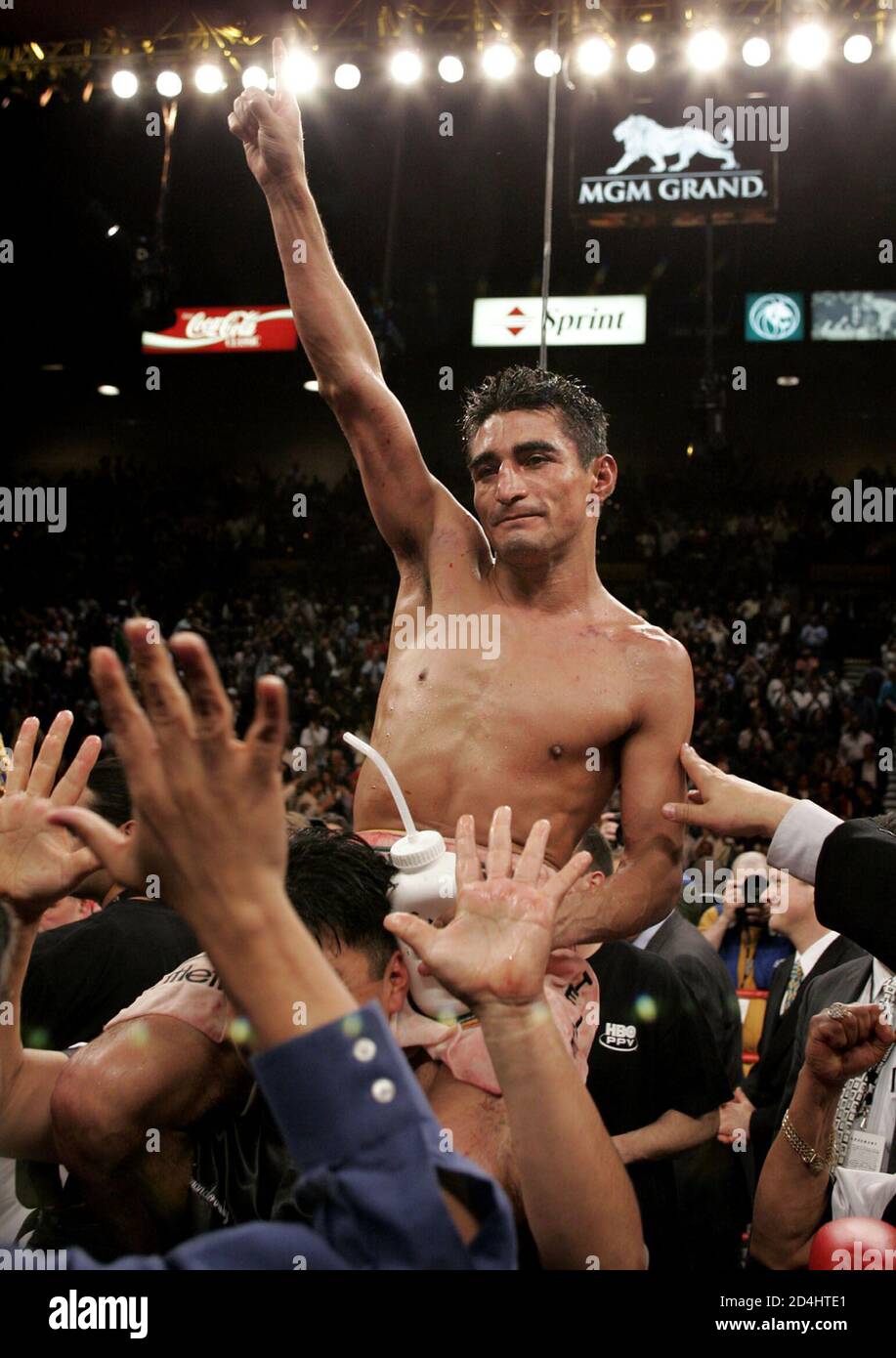 Super featherweight boxer Erik Morales of Tijuana, Mexico celebrates his victory over [Manny Pacquiao of Manila], Philippines at the MGM Grand Garden Arena in Las Vegas, Nevada March 19, 2005. [Morales beat Pacquiao in a 12-round fight by unanimous decision.] Stock Photo