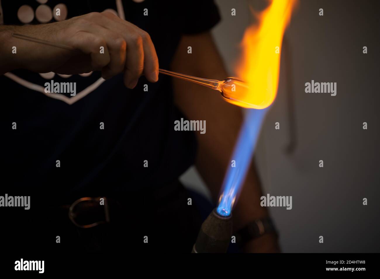 Glass blower forming a chemistry glass, closeup view, glass blower using a glassblowing  torch Stock Photo - Alamy