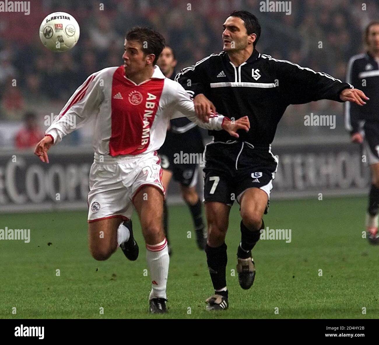 Ajax Amsterdam's Rafael van der Vaart (left) challenges Lausanne Sports' Massimo Lombardo during their UEFA Cup soccer match In the Artena stadium in Amsterdam November 9, 2000.  LVG Stock Photo