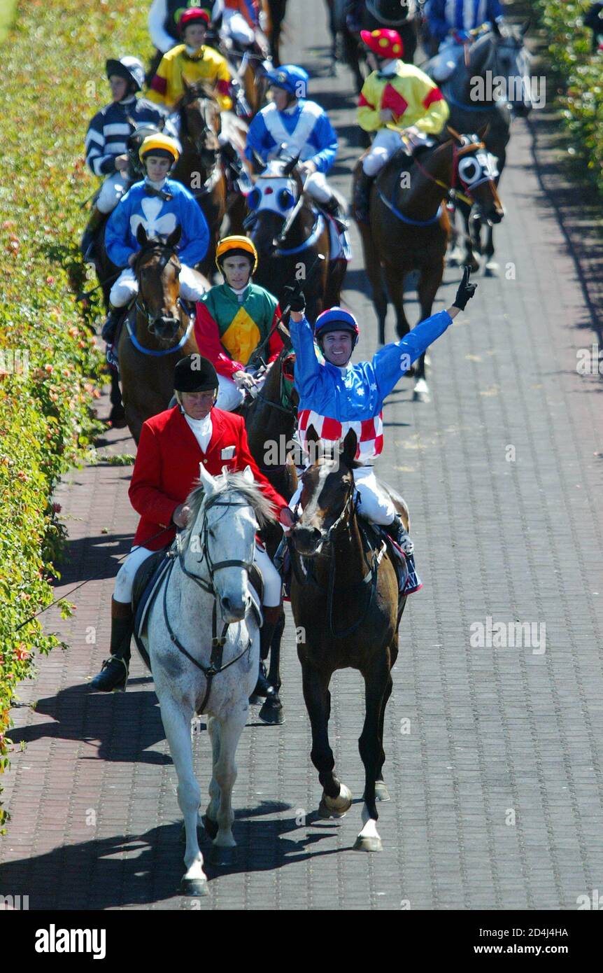 HIGH RESOLUTION FILE Jockey Glenn Boss front R Celebrates After 
