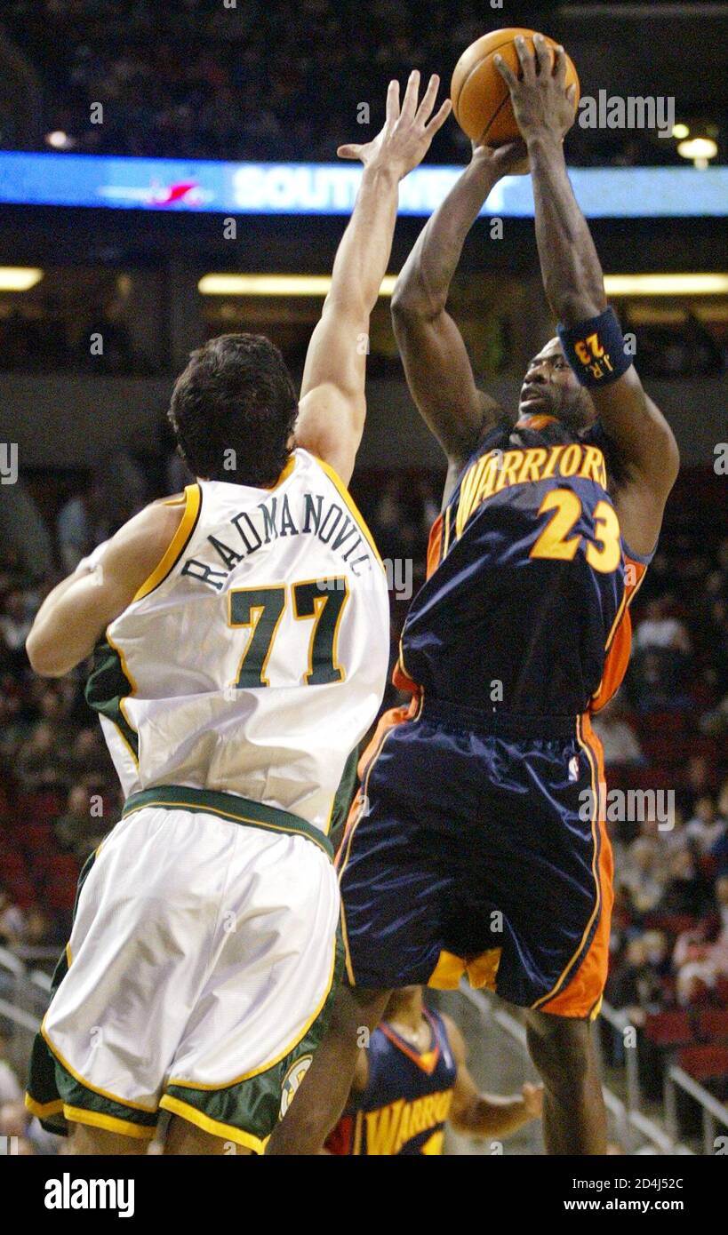 Golden State Warriors Guard Jason Richardson 23 Shoots Over Seattle Supersonics Forward Vladimir Radmanovic 77 During The First Quarter Of Their Nba Game At Key Arena In Seattle On January 22 04 Golden State Warriors Guard Jason Richardson 23 Shoots Over Seattle Supersonics Forward Vladimir Radmanovic 77 During The First Quarter Of Their Nba Game At Key Arena In Seattle On January 22 04