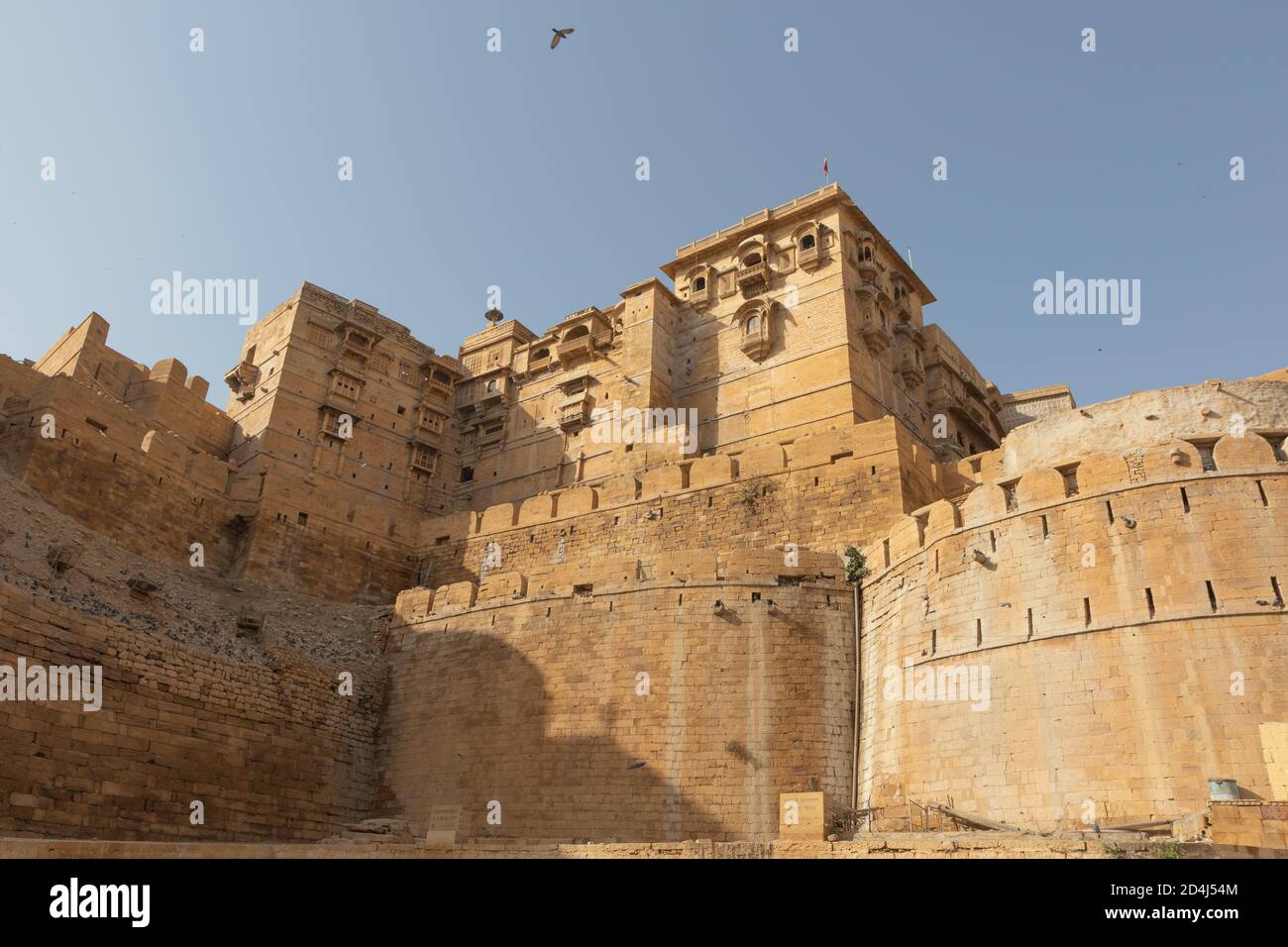 Front view of Jaisalmer fort taken from low angle with blue sky on horizon at Jaisalmer, India on 19 February 2018 Stock Photo