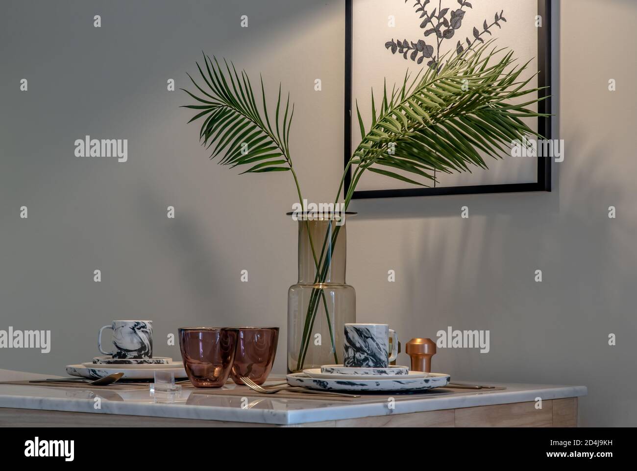 Dining table with vase of flower on marble table in home dining room ...