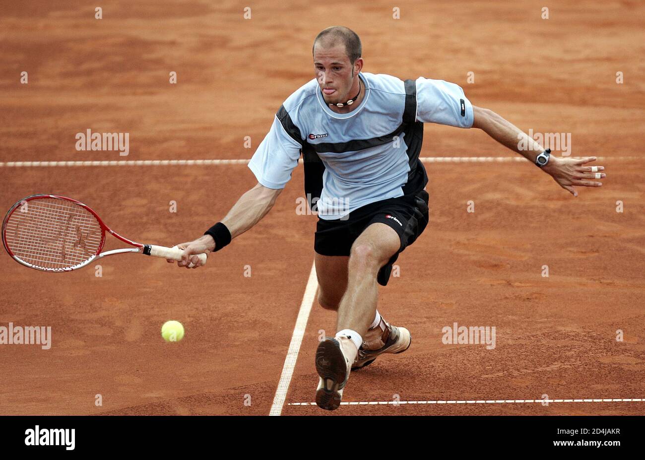 Austria's Marco Mirnegg stretches for the ball during a first round match  against compatriot Juergen Melzer at the Internationaler Grand Prix tennis  tournament in St. Polten. Austria's Marco Mirnegg stretches for the