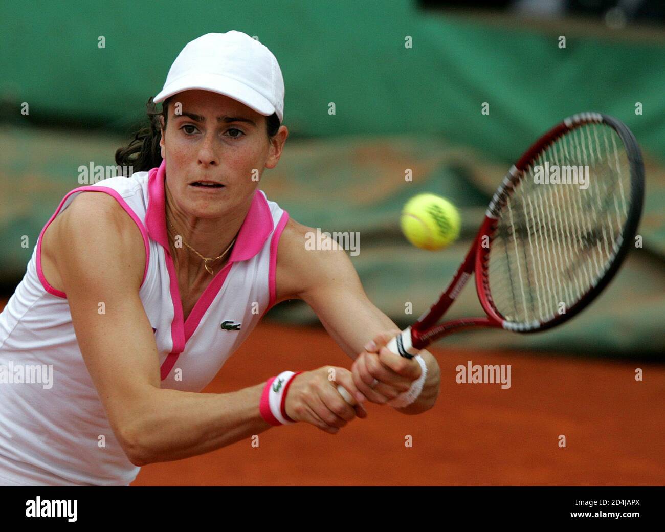 France's Nathalie Dechy returns a backhand during her match against [Czech  Republic's Michaela Pastikova in the first round of the French Open tennis  tournament at Roland Garros stadium May 24, 2005. [Dechy