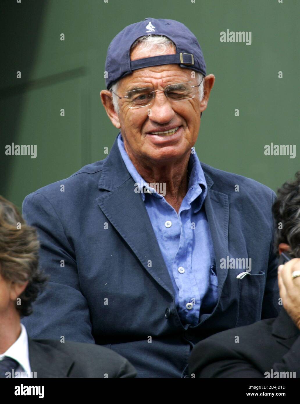 French actor Belmondo watches quarter-final match between Russia's  Davydenko and Spain's Robredo in the French Open tennis tournament. French  actor Jean-Paul Belmondo watches the quarter-final match between Russia's  Nikolay Davydenko and Spain's