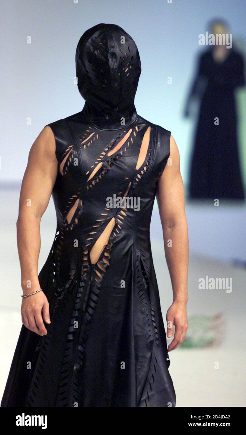 A male model for Hong Kong designer William Tang presents this creation at the Hong Kong Fashion Week for Fall/Winter 2001 January 18, 2001. More than 800 local and foreign exhibitors participate in the four-day long exhibition. Stock Photo