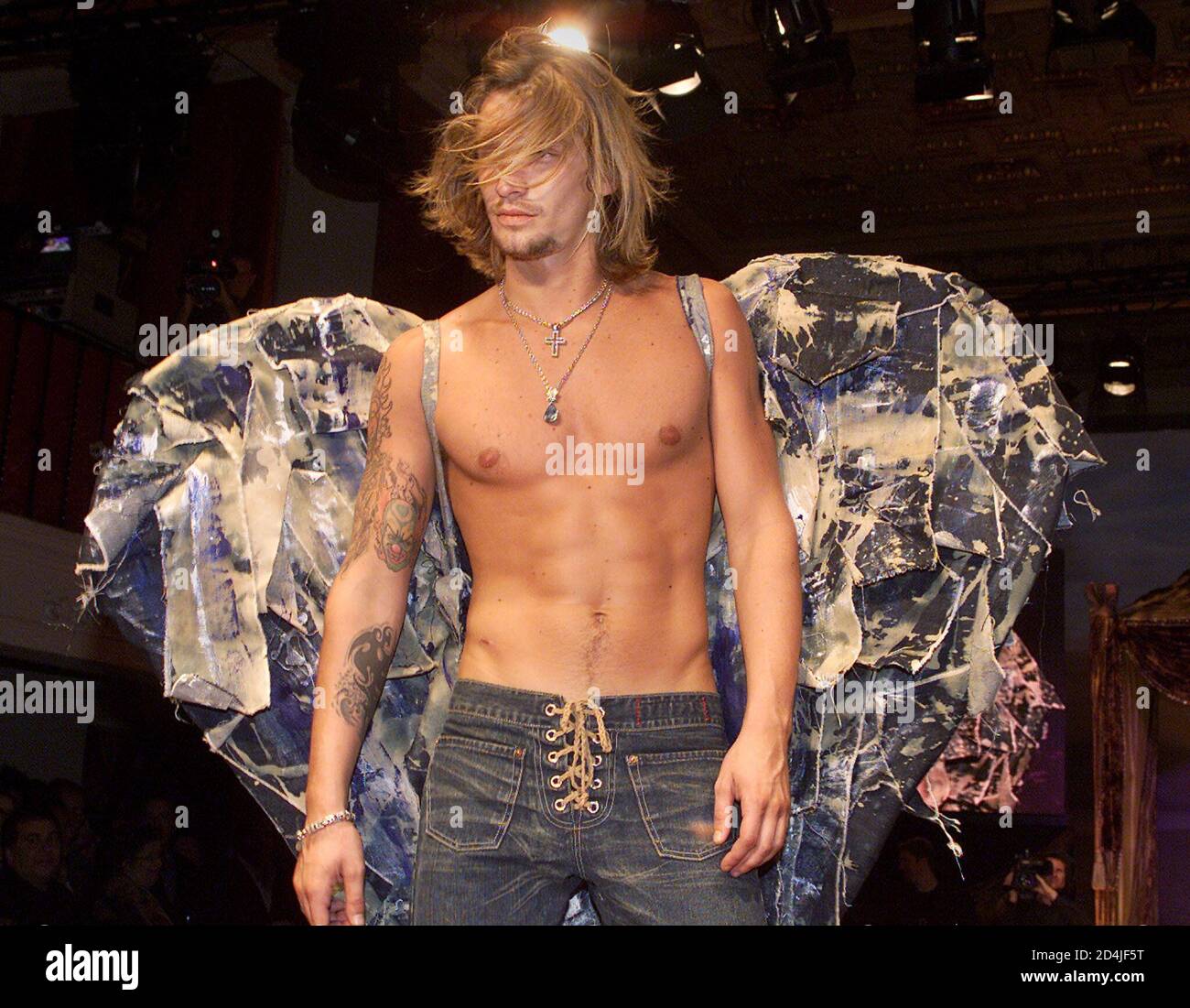 A model wearing GUESS? clothing designs 