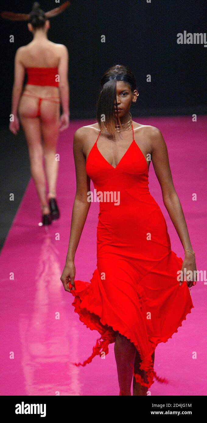 A Model Presents This Creation During Portuguese Designer Fatima Lopes Ready To Wear 2003 Spring Summer Collection In Paris October 9 2002 Stock Photo Alamy