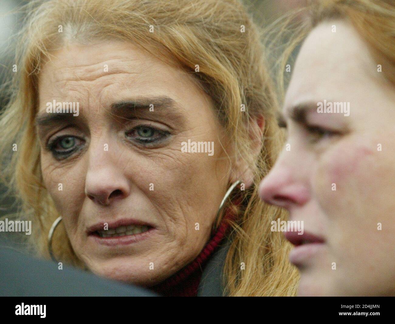 AGNES MCCONVILLE DAUGHTER OF MURDERED BELFAST WOMAN JEAN MCCONVILLE ATTENDS  HER MOTHERS FUNERAL IN WEST BELFAST Stock Photo - Alamy