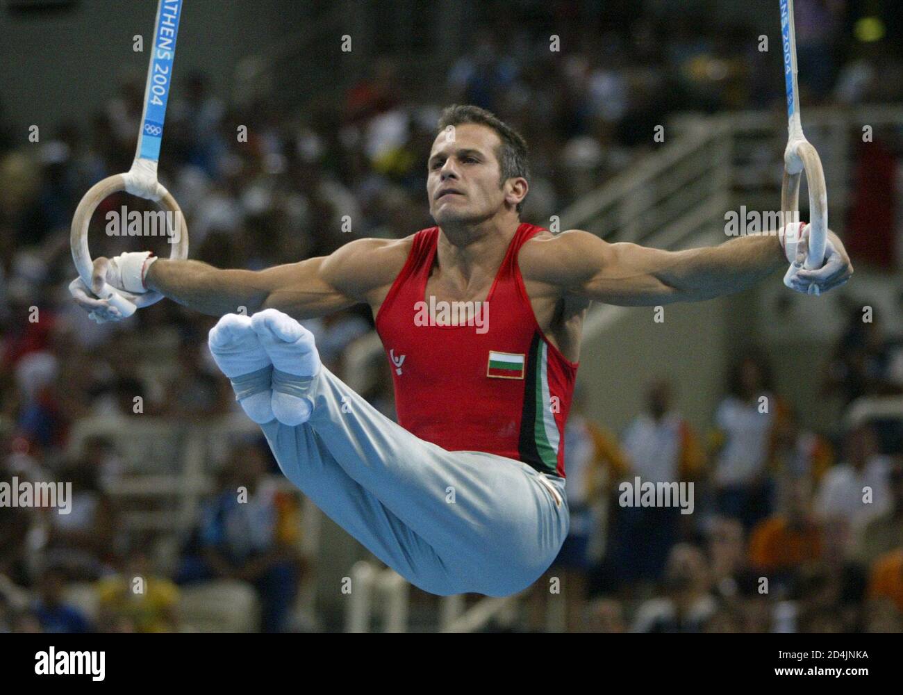 Bulgaria's silver medallist Jordan Jovtchev performs on the rings during  the gymnastics competition at the Athens 2004 Olympic Games August 22,  2004. Dimossthenis Tampakos of Greece took the gold medal ahead of