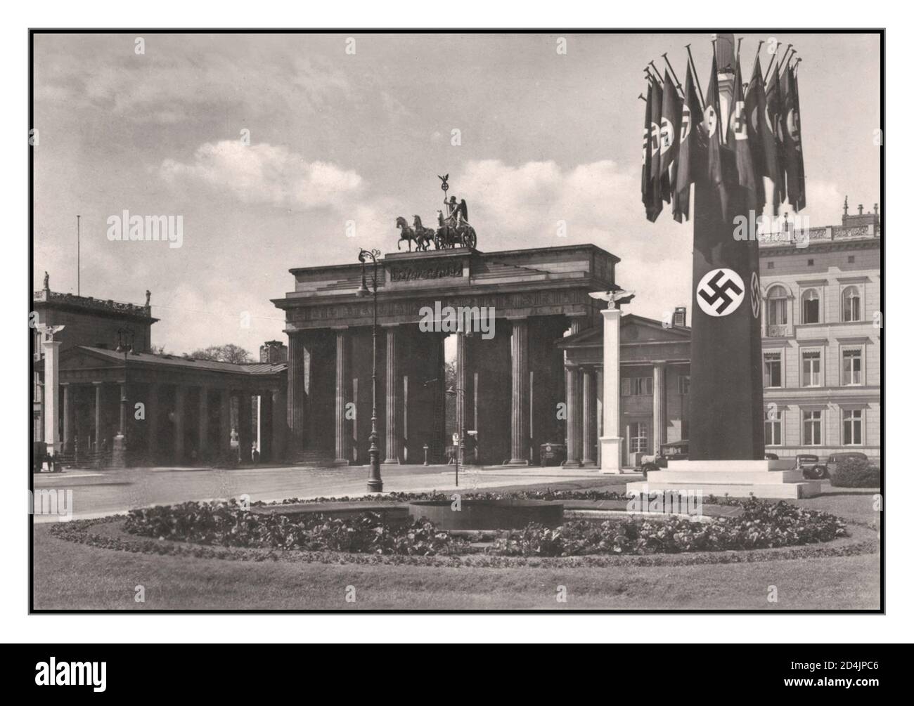 1930’s Berlin Nazi Germany Brandenburg Gate, Pariser Platz with Nazi Swastika Flags Berlin Germany  1930’s Stock Photo