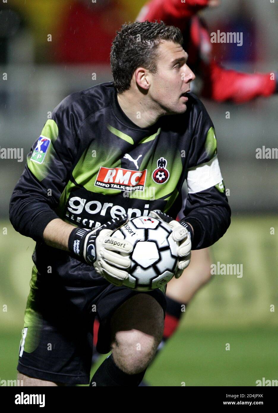 OGC Nice's goalkeeper and captain Damien Gregorini grabs the ball in his  French soccer Ligue 1 match against [AJ] Auxerre at Abbe Deschamps stadium  in Auxerre, December 18, 2004. Auxerre won 4-3