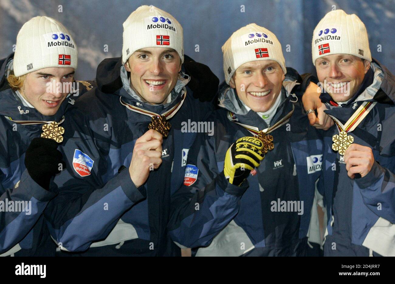 Norway's Petter Tande, Magnus Moan, Kristian Hammer and Havard Klemetsen  (L-R) present their gold medals after the Nordic Combined team competition  at the Nordic World Championships in Oberstdorf, southern Germany, February  23,