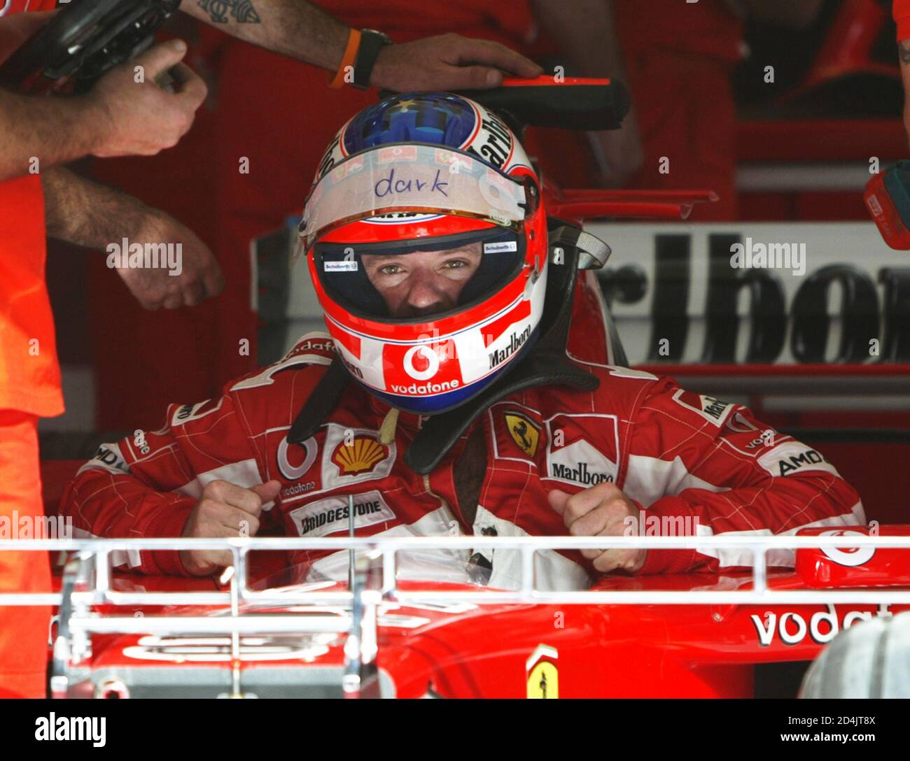 Ferrari Formula One Driver Rubens Barrichello Of Brazil Tests The Seat Of The New F05 Model Before The Bahrain Grand Prix In Sakhir South Of The Capital Manama March 31 05 World