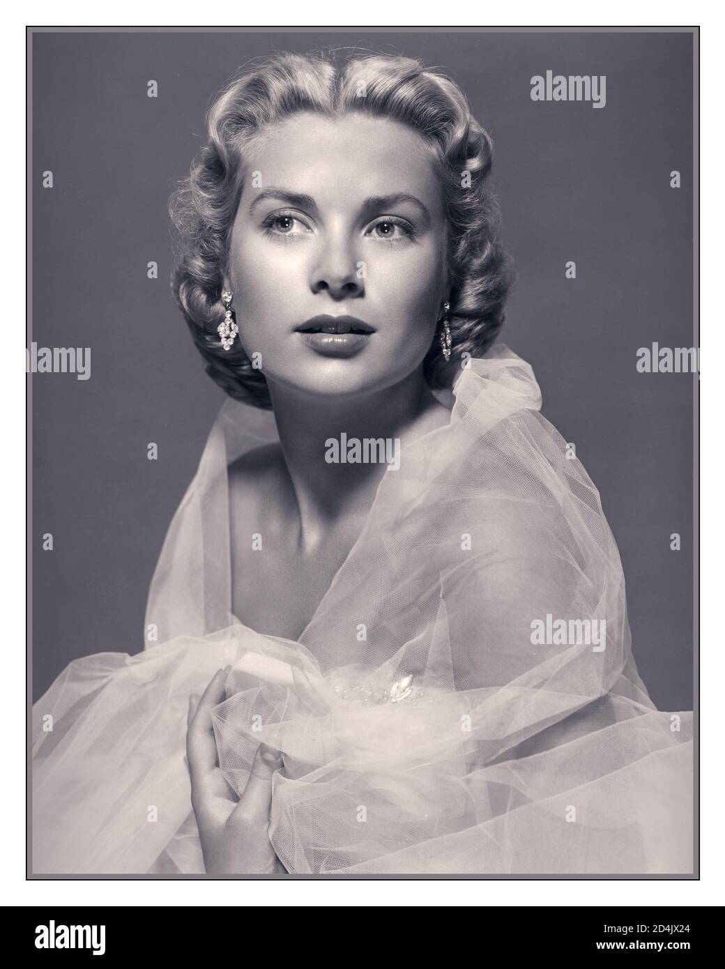 1950's GRACE KELLY Dial M For Murder Grace Kelly In Publicity Shot 1954 studio promotional portrait Hollywood actress Grace Kelly in 1954. Grace Patricia Kelly, also known as Grace of Monaco, was an American film actress who, after starring in several significant films in the early to mid-1950s, became Princess of Monaco by marrying Prince Rainier III in April 1956 Hollywood USA Stock Photo