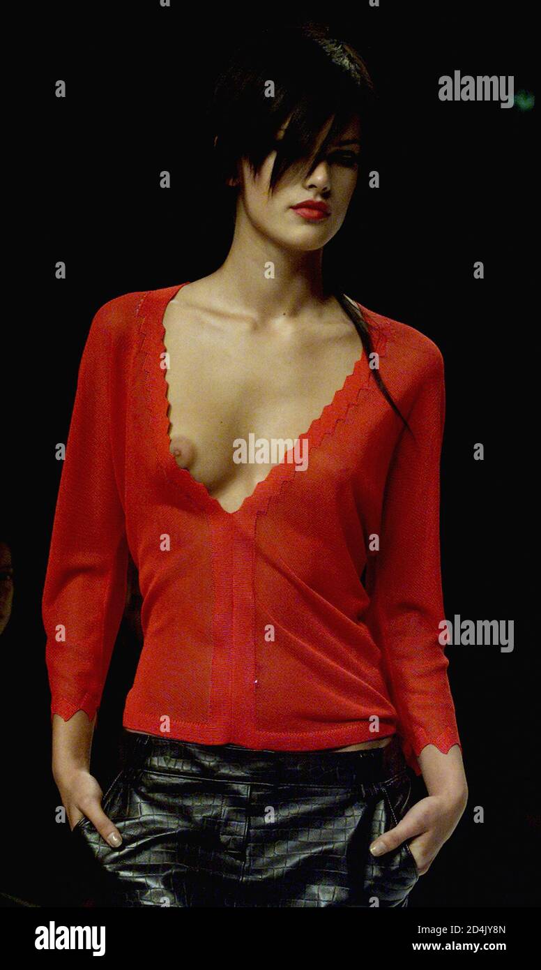 A model wears red jersey with leather skirt as part of Victor Bellaish's  Spring/Summer ready-to-wear women's collection 2001in Milan September 30,  2000. The Milan fashion show will run until October 6 with