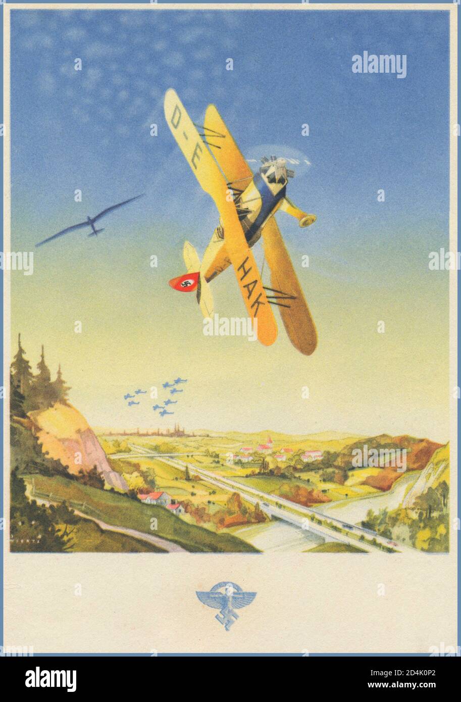 Vintage 1937 Nazi Propaganda National Socialist Flying Corps Poster Card with bi-plane bearing swastika symbol on tail fin. Deutsche Kunstflug-Meisterschaff  (German aerobatic championships) by artist Jupp Wiertz Stock Photo
