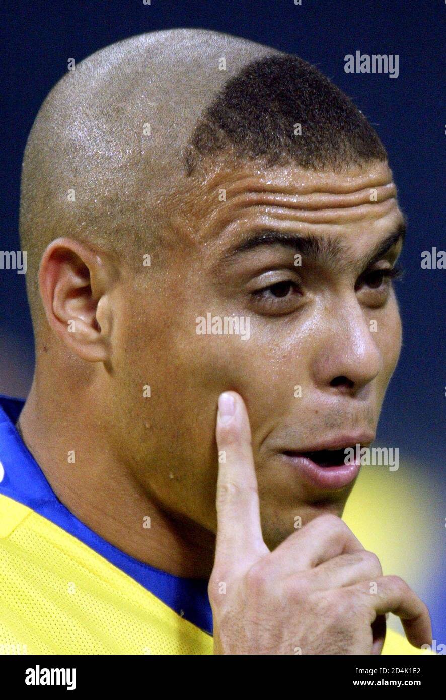 Brazil S Striker Ronaldo Points To His New Hair Cut As He Trains With His Team At Saitama Stadium June 24 02 Ronaldo Who Has Been Suffering From An Injured Thigh Took Part