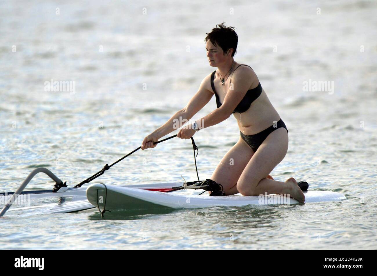 Skipper Ellen MacArthur of England practices winsurfing on a beach at  Pointe-a-Pitre, November 25, 2002. MacArthur won the Route du Rhum sailing  race November 19th in the monohull class in the seventh