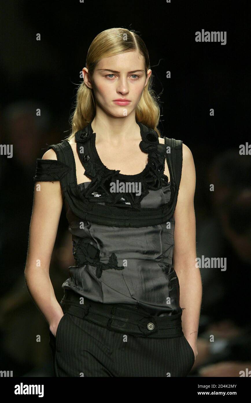 A model displays an outfit as part of Prada women's collection Autumn/Winter  2003/2004 in Milan February 28, 2003. The Milan fashion shows run until  March 4, 2003 Stock Photo - Alamy