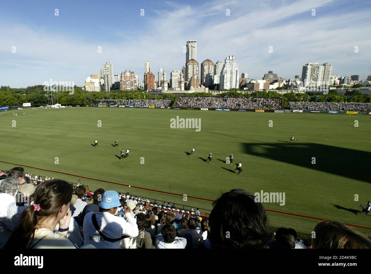View of polo match between La Dolfina and Ellerstina at the Polo Argentine  Open championship in Buenos Aires. View of polo match between La Dolfina  and Ellerstina seen against the backdrop of