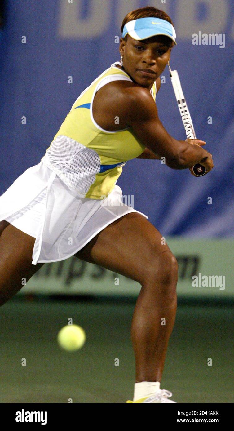 U.S. tennis player Serena Williams keeps her eye on the ball as she  prepares to hit a backhand to Russia's Elena Bovina during the second round  of the Dubai Open March 2,