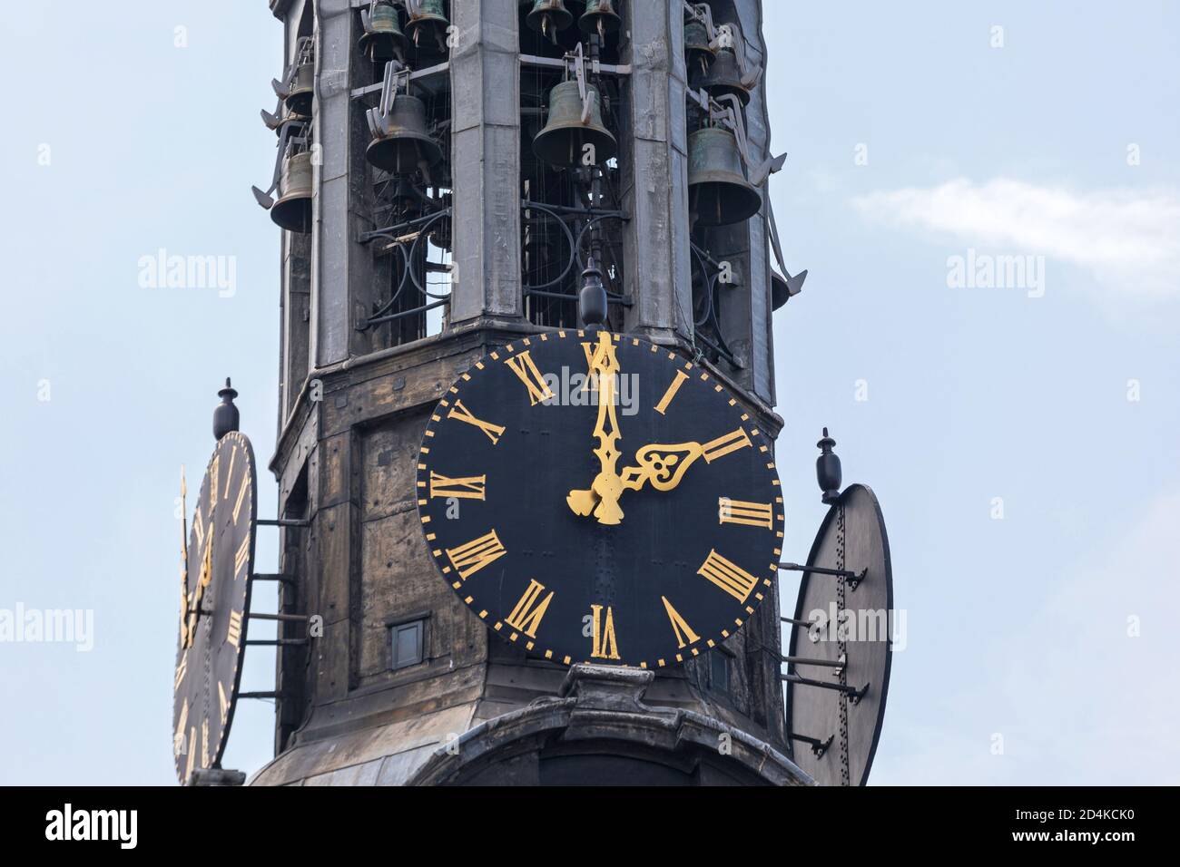 Black Dial Clock With Golden Needles at Church Spire in Amsterdam Stock Photo