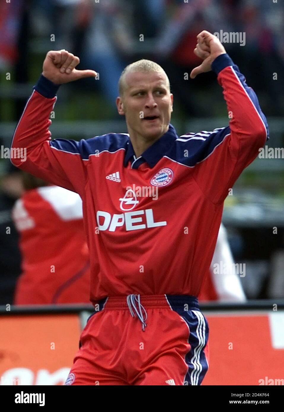 Bayern Munich's Carsten Jancker celebrates his goal [against Schalke 04] in  the second minute of their German first division top match in Munich's  Olympic stadium, April 14, 2001. [Bayern leads Germany´s first