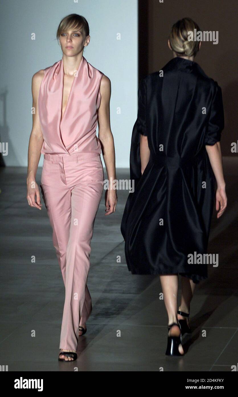 A two models display outfits as part of Jil Sander Spring/Summer  ready-to-wear women's collection 2002 in Milan September 30, 2001. The  Milan fashion shows will run until October 3 Stock Photo - Alamy