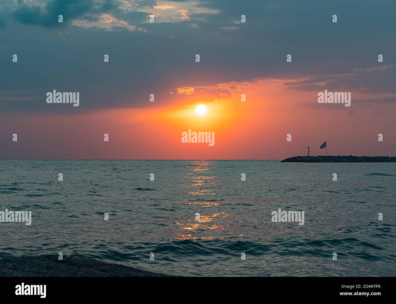 Sunrise over the sea and beautiful cloudscape Stock Photo - Alamy