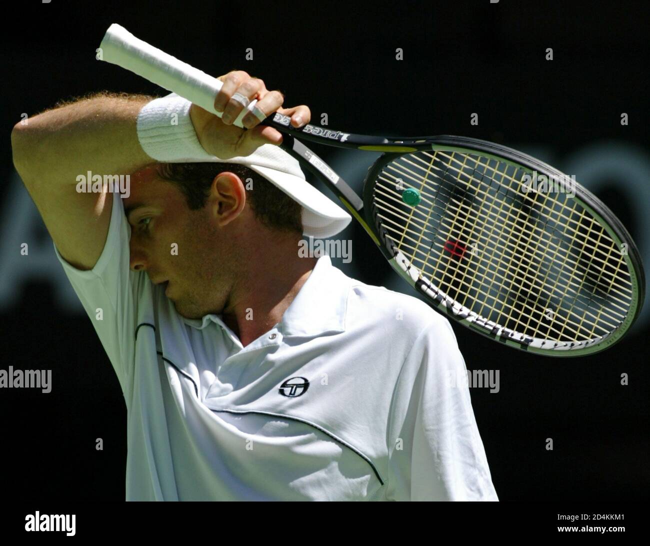 Italy's Filippo Volandri reacts during his second round match against third  seed Juan Carlos Ferrero of Spain at the Australian Open tennis  championship in Melbourne January 22, 2004. Ferrero won the match