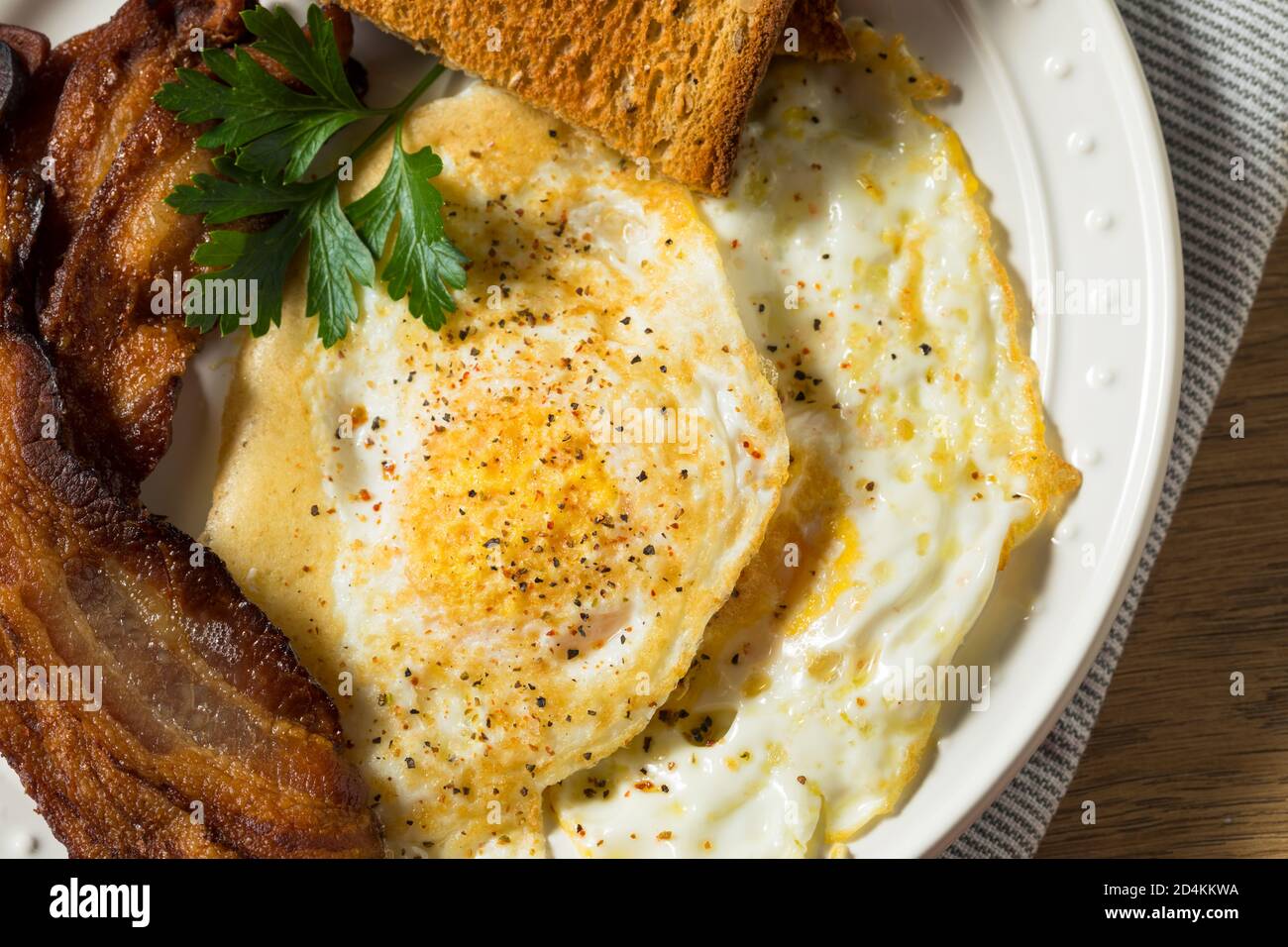 Homemade Over Easy Eggs with Bacon and Toast Stock Photo Alamy