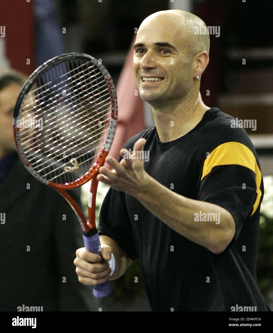 Andre Agassi of the U.S. celebrates his victory over Tommy Robredo of Spain  after their quarter-final match at the Madrid Masters tennis tournament in  Madrid, October 22, 2004. Agassi won 6-7 6-3