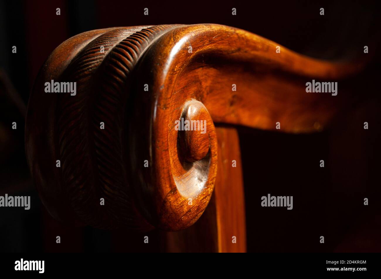 Wooden sofa handle on dark background Stock Photo Alamy