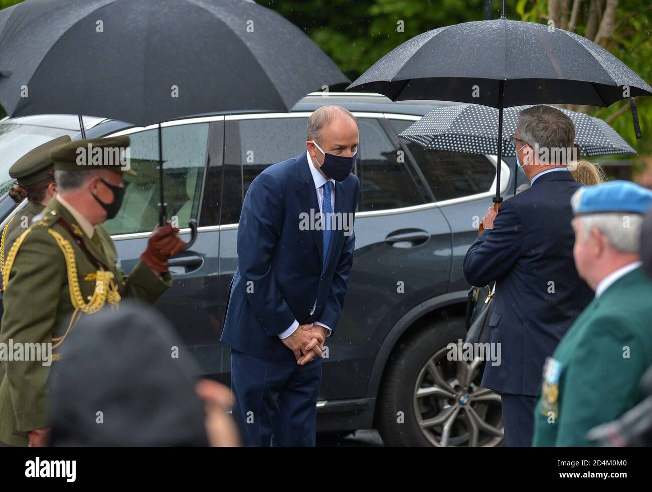 Irish Taoiseach Micheál Martin wearing a face mask at the funeral of John Hume in Derry. ©George Sweeney / Alamy Stock Photo Stock Photo
