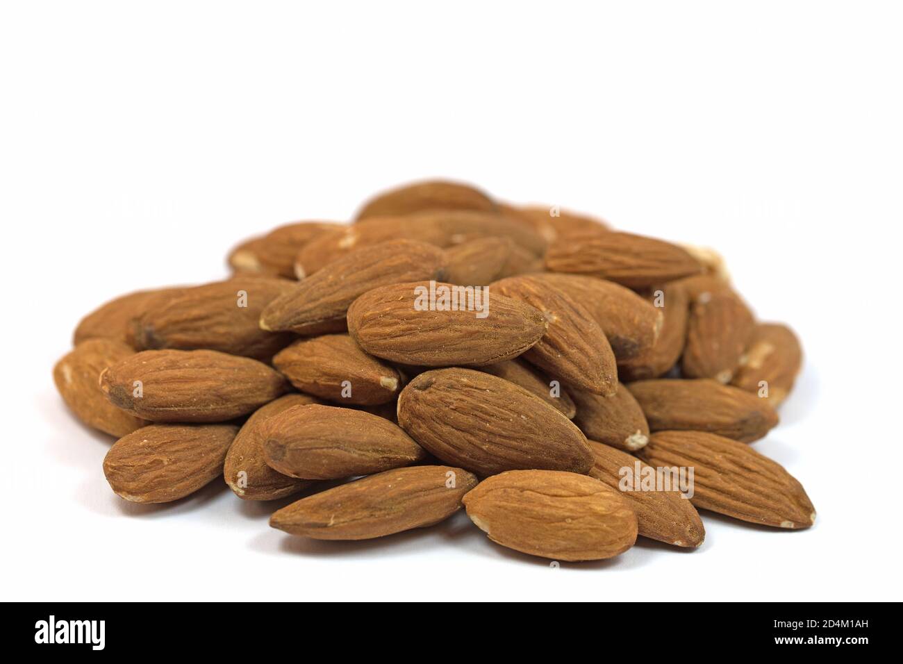 Almond kernels isolated against a white background Stock Photo Alamy