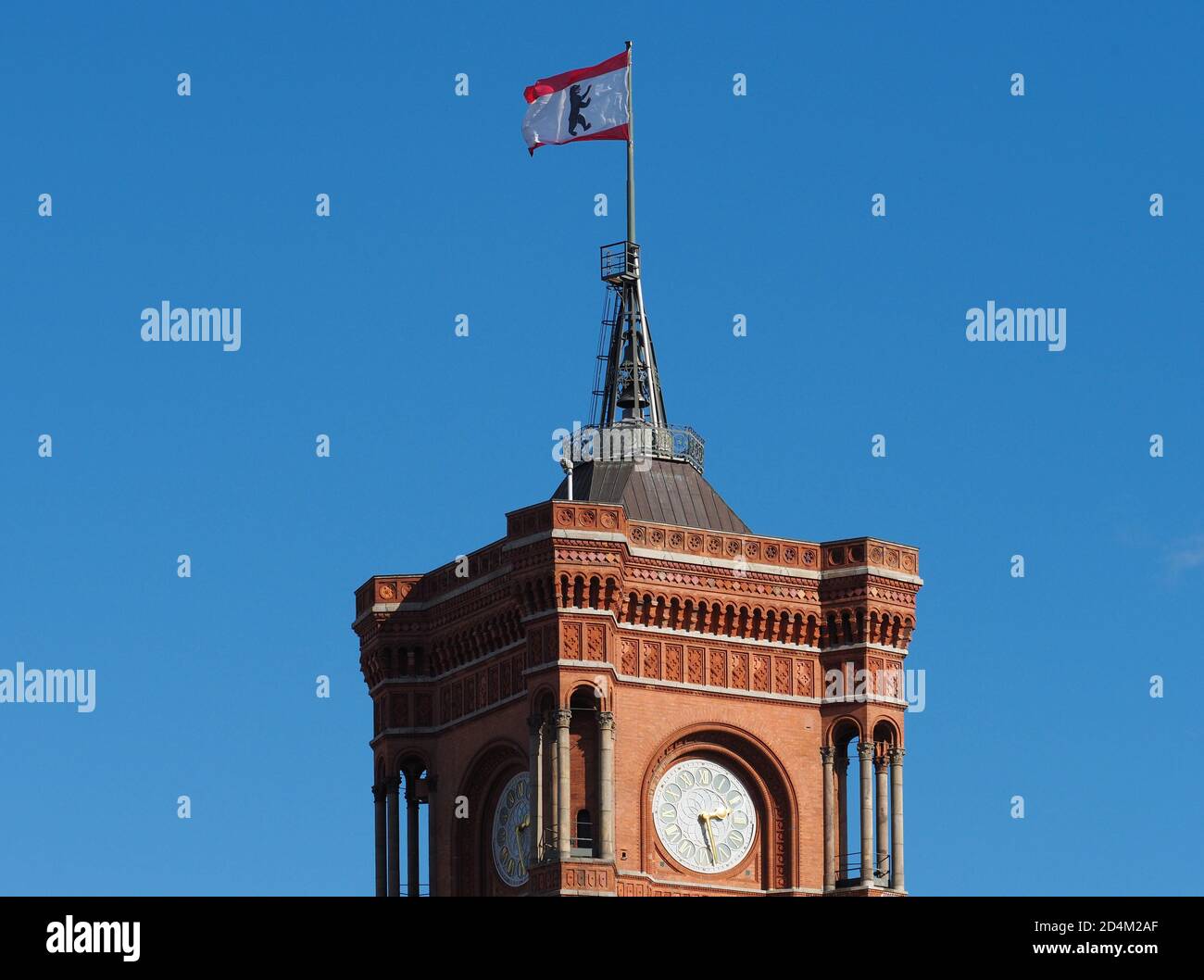 04 October 2020, Berlin: The flag with the Berlin coat of arms is waving on the top of the tower of the Rotes Rathaus. Photo: Soeren Stache/dpa-Zentralbild/ZB Stock Photo