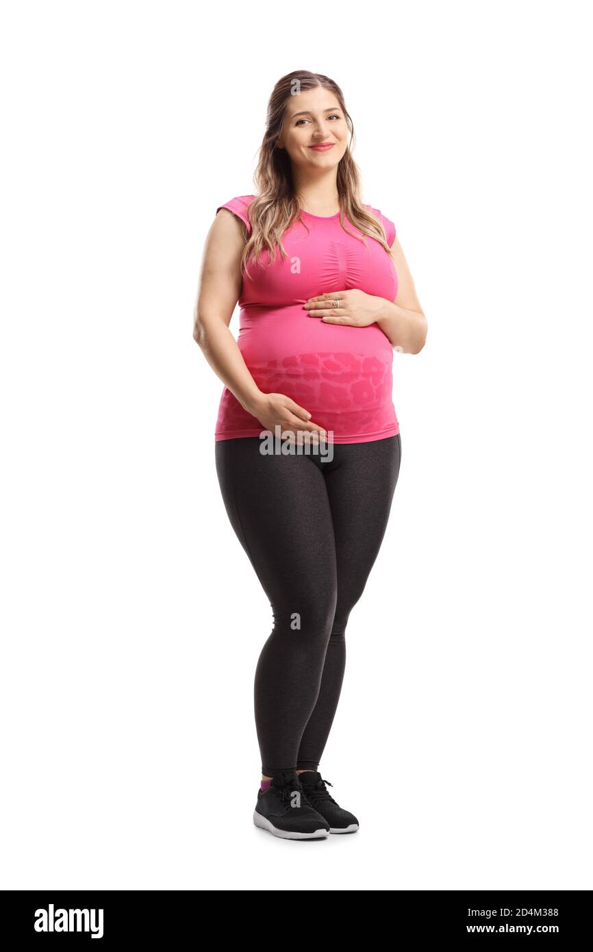 Pregnant Woman in Pink Leggens Tender Holding Her Belly, Isolated