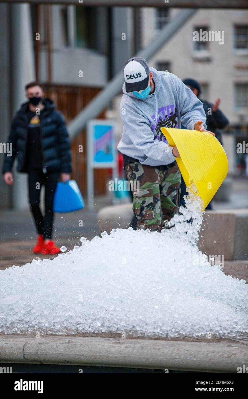 Edinburgh, Scotland, UK. 9th Oct 2020. Hospitality staff from across the capital dumped their excess ice outside the Scottish Parliament after being ordered to close from 6pm today under new Coronavirus restrictions. Photo: Andrew Perry/Alamy Live News Stock Photo