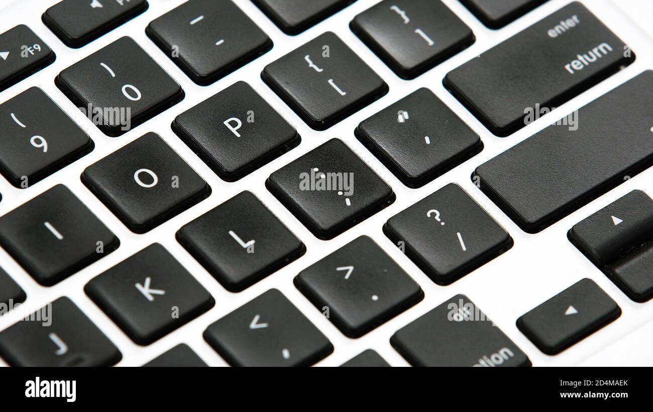 Laptop computer keyboard keys close up, black and white. Stock Photo