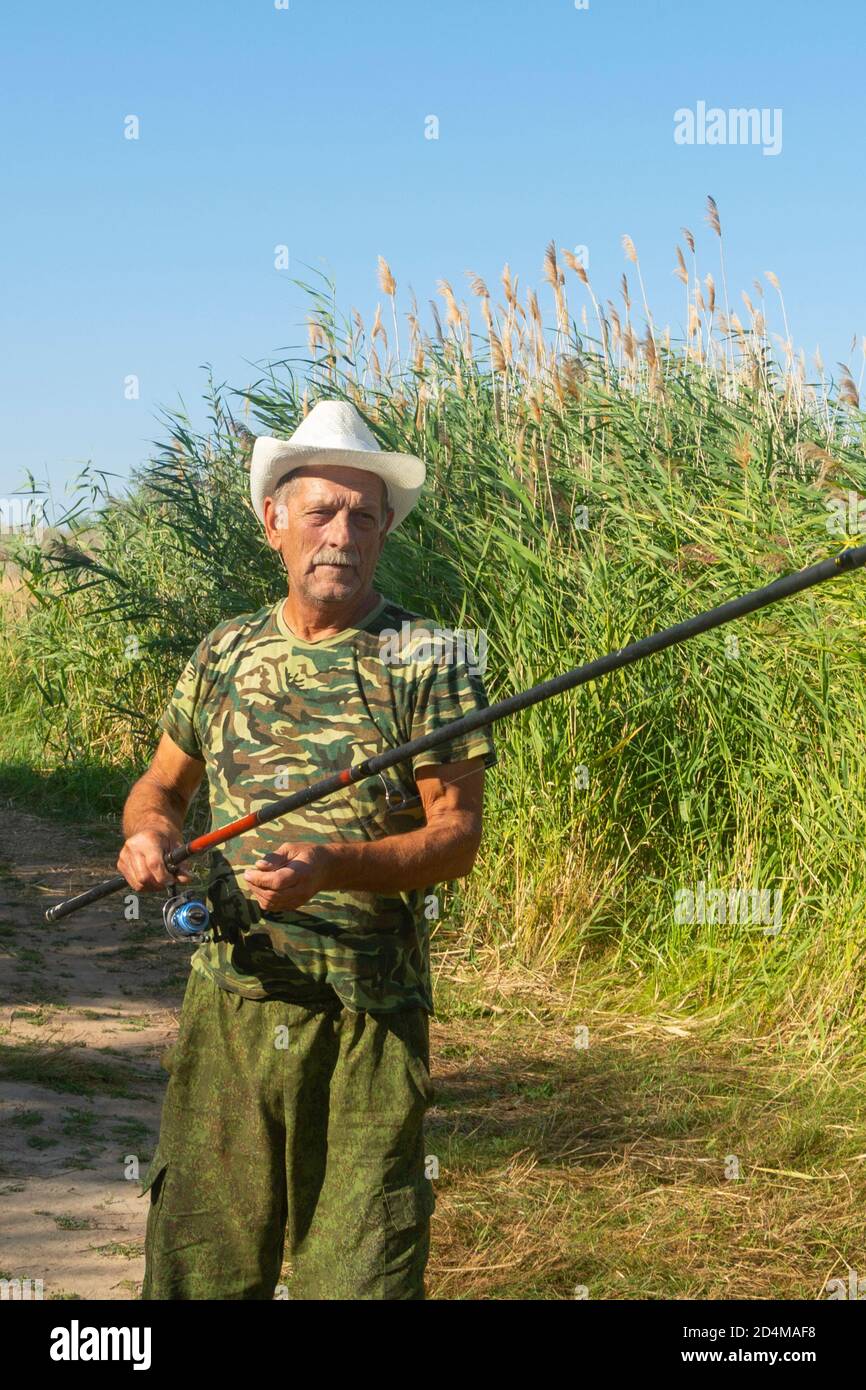 Never Underestimate An Old Man With A Fishing Rod Flat Bill Trucker Hat