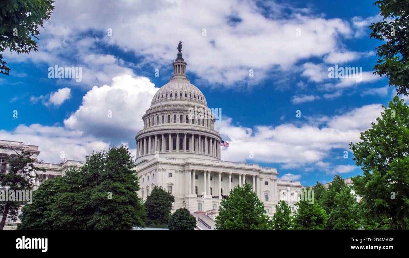 United States Capitol of America Congress, Capitol Building West front in low angle view against the cloudy blue sky. Washington, D.C., USA, U.S. US. Stock Photo
