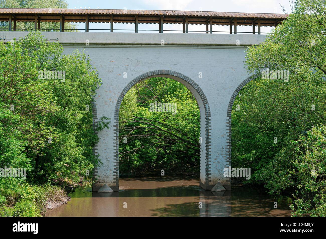 Moscow, Russia - June 9, 2020: Waterworks aqueduct in the Yauza River Valley in Moscow. Historical aqueduct of the 18th century made of white stone in Stock Photo